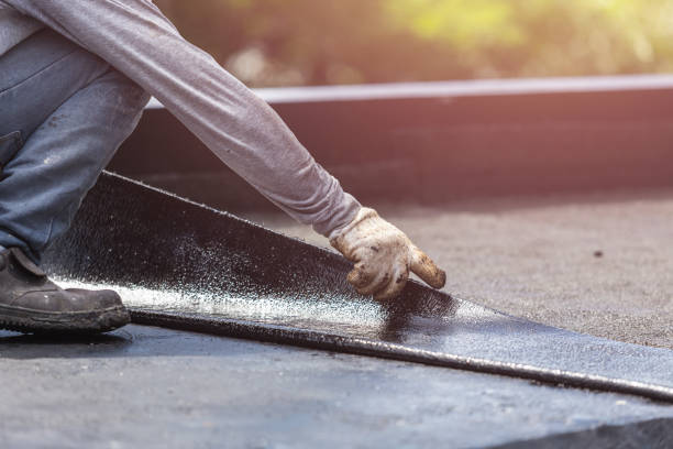 Professional Basement Waterproofing technician working in Roselle, NJ